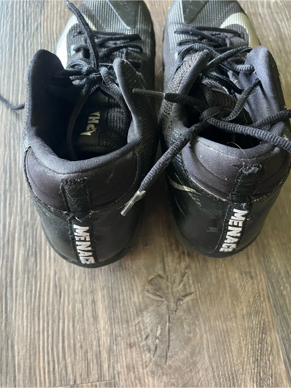 Nike Menace Men’s Black Cleats with White Swoosh